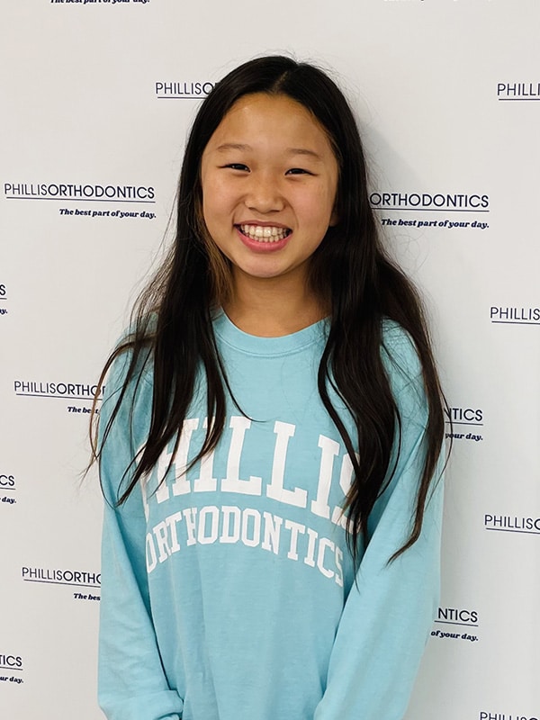 Girl smiling at Phillis Orthodontics in Chelmsford, MA